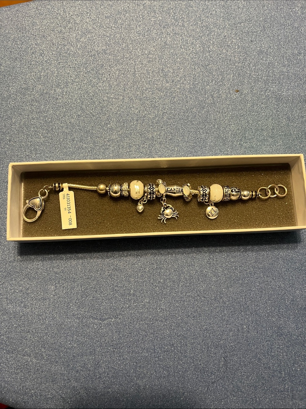 Sterling Silver Charm Bracelet with Cream Beads